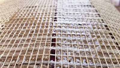 Mesh-backed Turkish marble and onyx slabs prepared for export